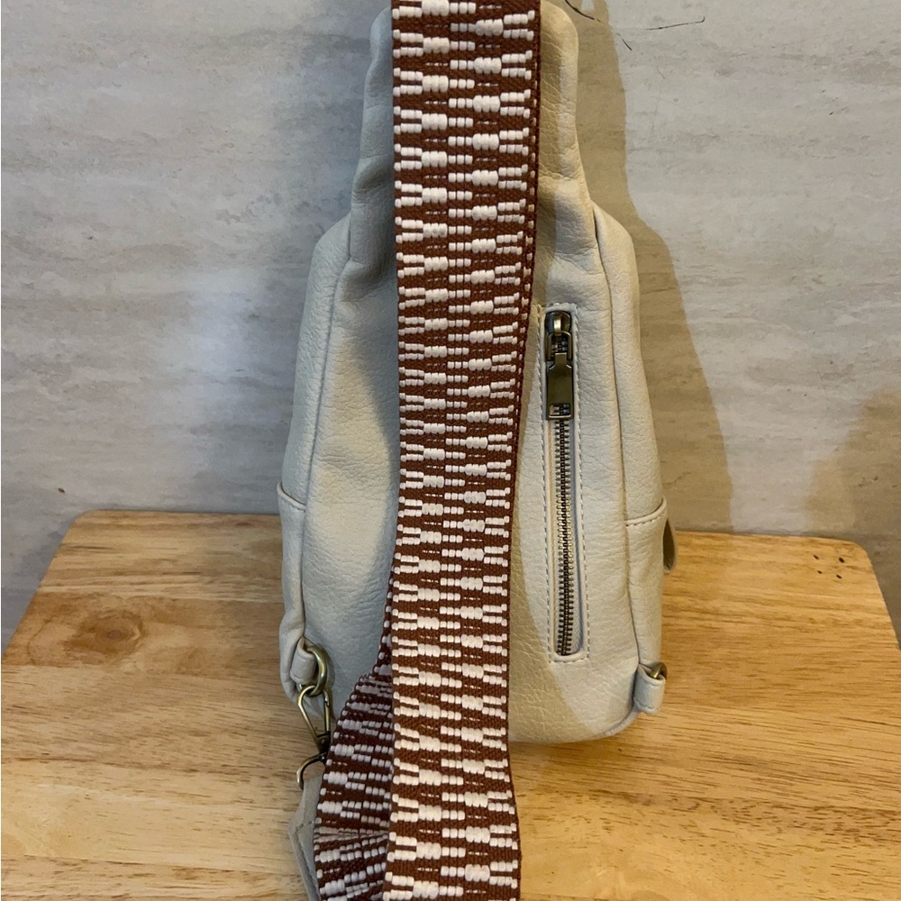 Urban Expressions Liberty leather sling bag with a chevron pattern strap. - Picture 5 of 16
